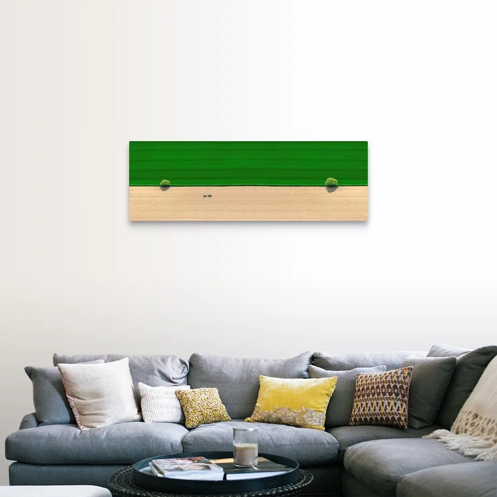 "Aerial view of a tractor in field" Canvas Wall Art